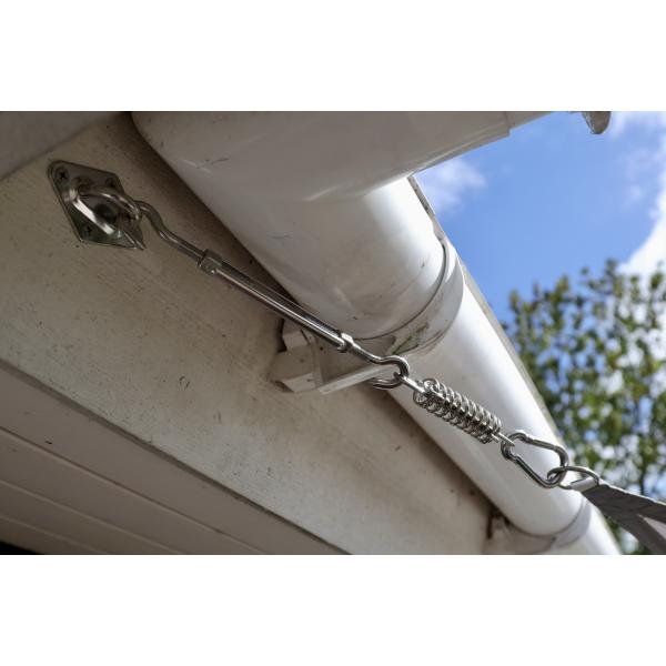 Aflastningsfjeder til solsejl